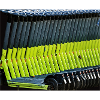 neon green e-scooters parked in row