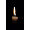 La flamme d’une bougie dans l’obscurité