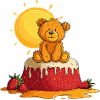 Teddy bear on cake with sun