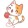 Happy kitten and yarn