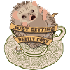 Cuddly hedgehog in teacup