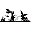 three rabbits in a meadow