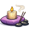 Zen candle on purple pillow