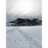 Snowbound Horizon Under Pale Sun