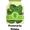 Green cucumbers in a mason jar