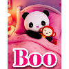 Panda Plush Toy on Pink Bed