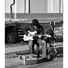 Straßenmusiker mit Gitarre