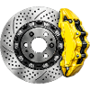 Perforierte Bremsscheibe und gelbe Bremssättel