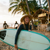 Beach surfer with surfboard