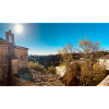Sunny Tuscan Village with Rooftops
