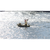 Fischerboot im Glitzermeer