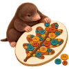 Maulwurf legt ein Knopfmosaik