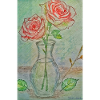 Zwei rote Rosen in einer Vase