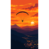 Sonnenuntergang Paraglider über Bergkette