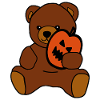 Niedlicher Teddybär mit Halloween-Kürbis