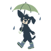 Süßer Hund mit Regenschirm