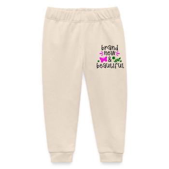 Baby Brandneu Brandnew und schön - Baby Organic Jogginghose Baby Tumbler von Stanley/Stella - Natur - Vorne
