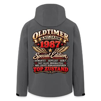 Oldtimer Baujahr 1987 – Special Edition - Recycelte Männer Softshell-Jacke von Stanley/Stella - Anthrazit - Hinten - AI Model Male 185 light (185cm)