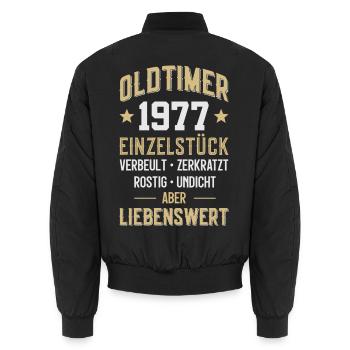 LUSTIG 49. GEBURTSTAG OLDTIMER 1977 EINZELSTÜCK - Unisex Bomberjacke - Schwarz - Hinten - AI Model Male 185 light (185cm)