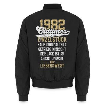 LUSTIG 44. GEBURTSTAG OLDTIMER 1982 EINZELSTÜCK - Unisex Bomberjacke - Schwarz - Hinten - AI Model Male 185 light (185cm)