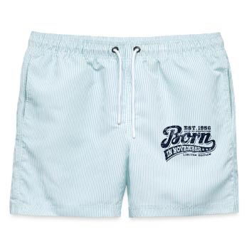 Born in November 1956 - Geburtstag - Geschenk - Männer Badeshorts - hellblau gestreift - Vorne - AI Model Male 178 light (178cm)