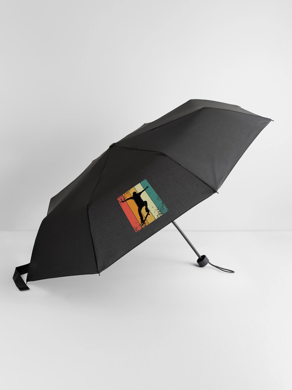 Retro-Skate-Silhouette auf farbigen Panels - Regenschirm (klein) - Schwarz - Vorne