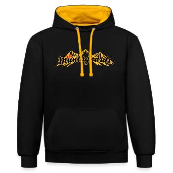 muntagnards - Die Bergler in Bündner Romanisch - Kontrast-Hoodie - Schwarz/Gold - Vorne - Anna (173cm) & Nico (186cm)