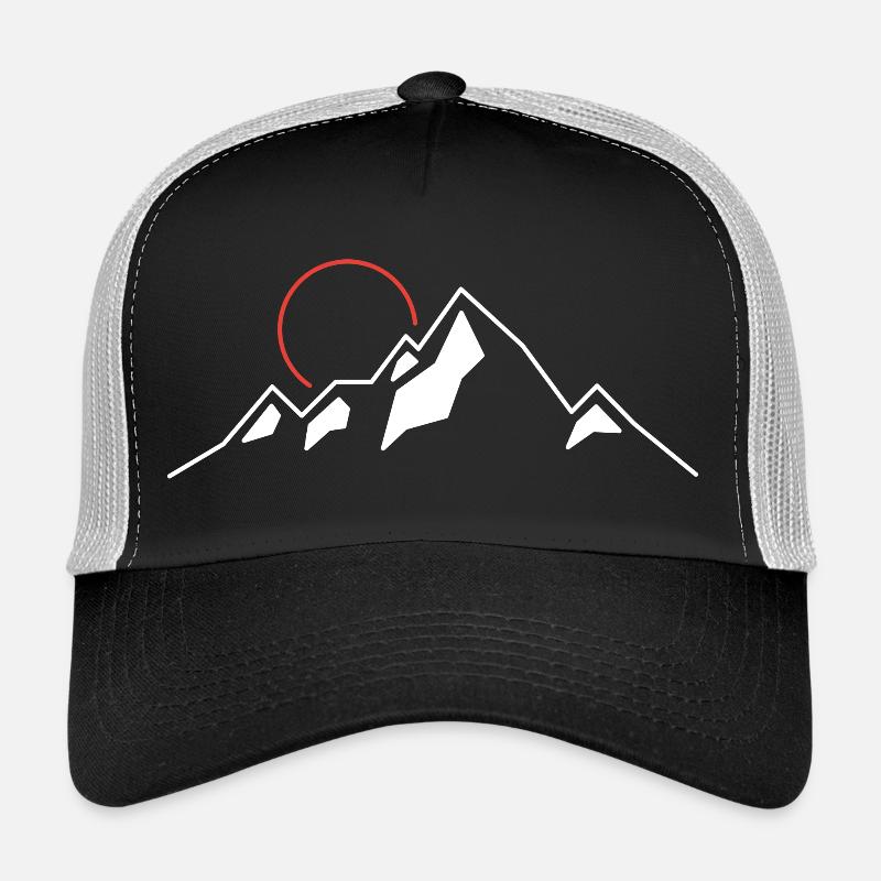 Soleil pourpre sur les sommets alpins Casquette trucker 
