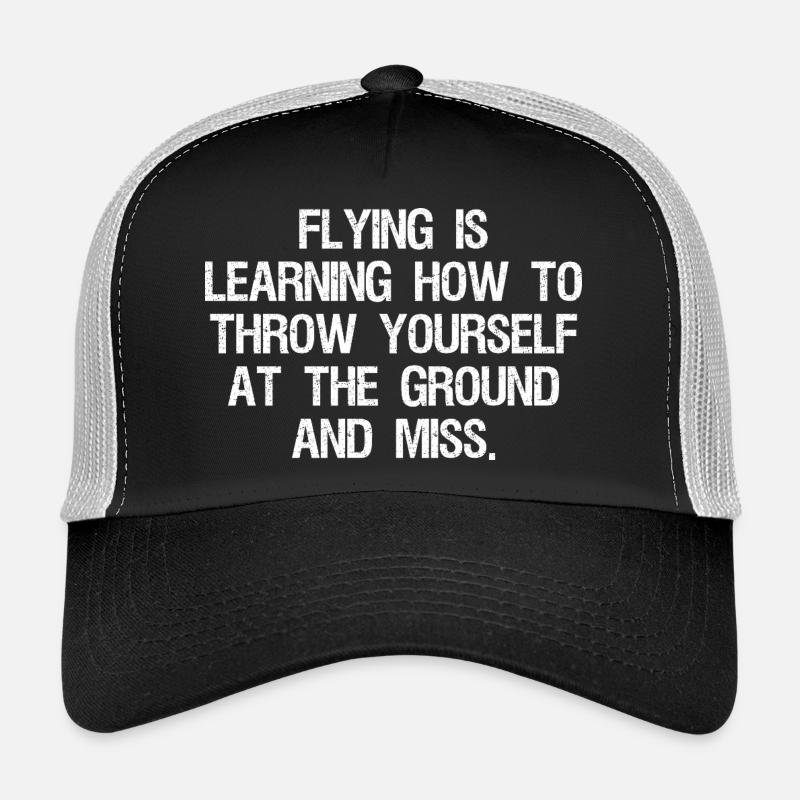 flying is learning how to throw yourself at the Trucker Cap
