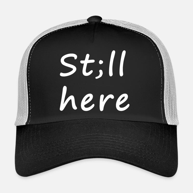 St;ll here – still not silent Trucker Cap