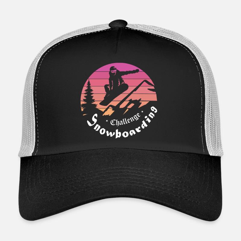 Snowboarder silhouette over mountain sunset Trucker Cap