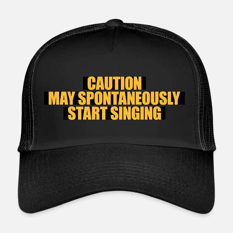 may spontaneously start singing Trucker Cap