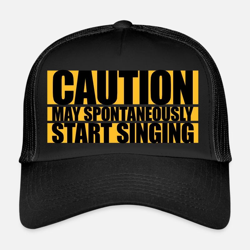 may spontaneously start singing Trucker Cap