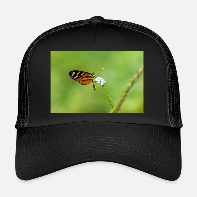 Der Schmetterling auf der Blume Trucker Cap