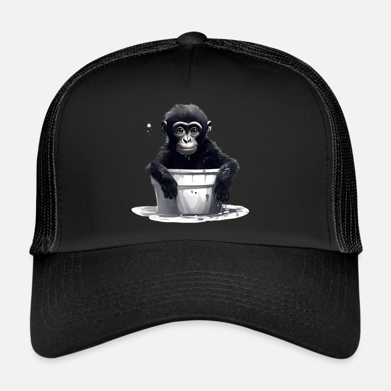A monkey defies climate change Trucker Cap
