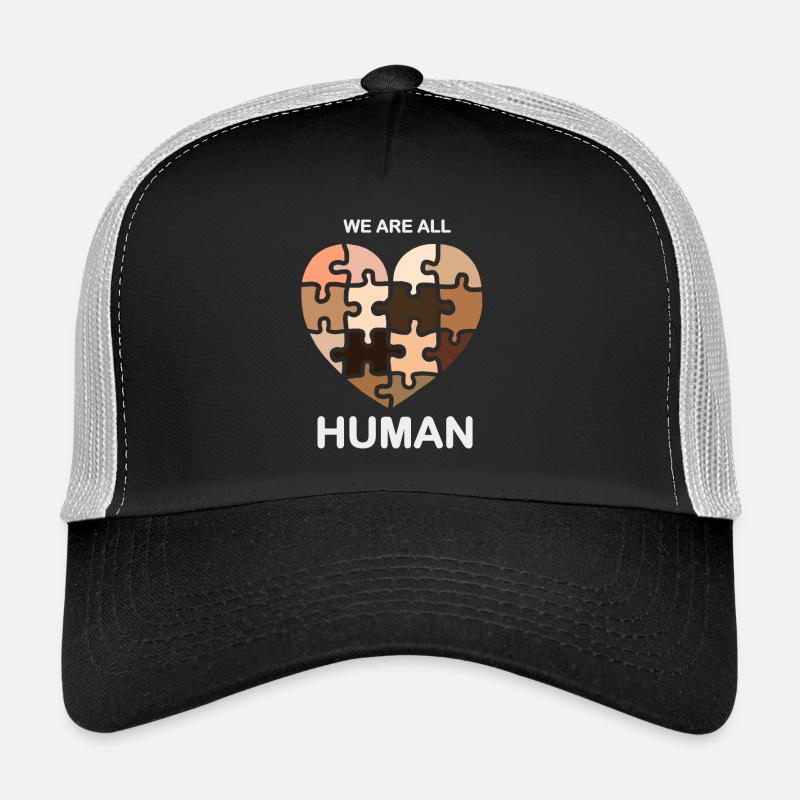 WE ARE ALL HUMAN PUZZLE Trucker Cap
