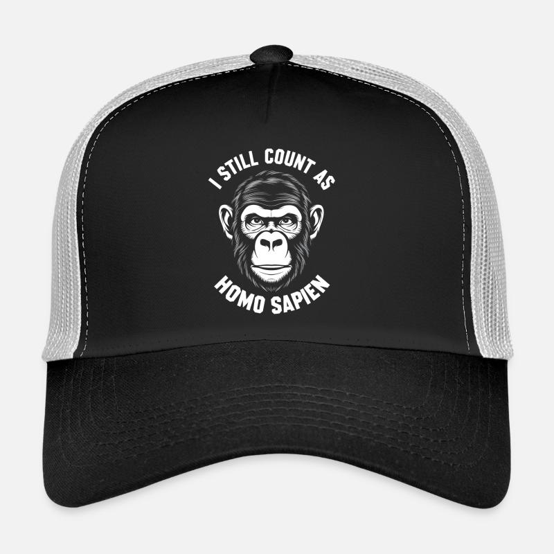 I still count as homo sapien monkey Trucker Cap