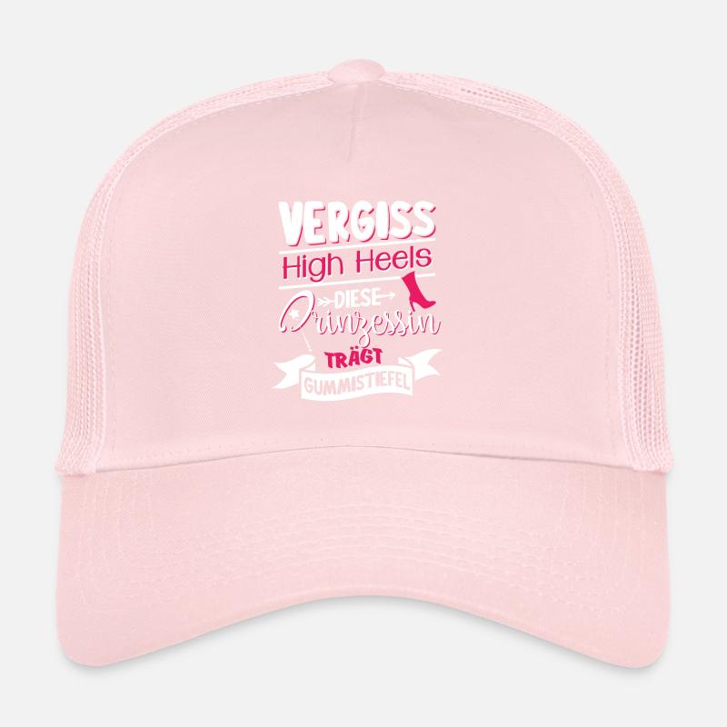 Cette princesse porte des bottes en caoutchouc Casquette trucker 