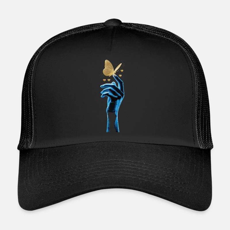 Papillon doré sur une main lumineuse Casquette trucker 