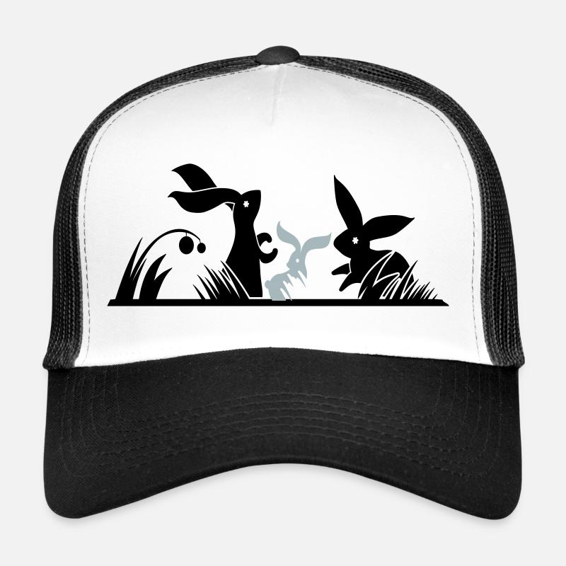 three rabbits in a meadow Trucker Cap