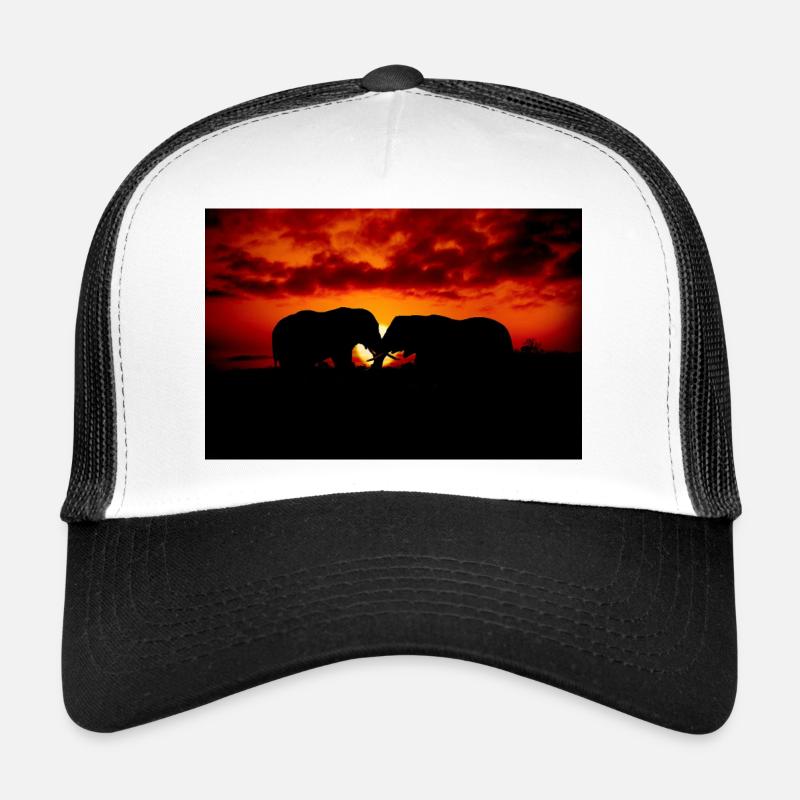 Silhouette d’éléphants au coucher du soleil Casquette trucker 