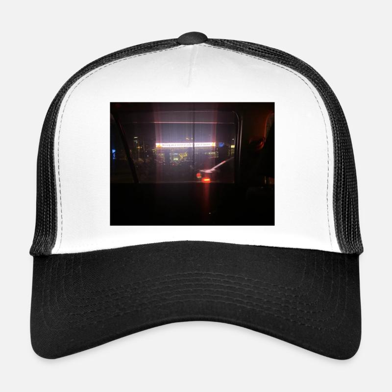 Neon lights skyline in the dark Trucker Cap