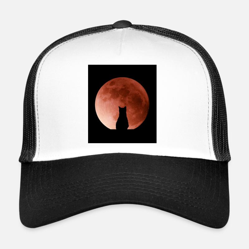Cat admiring the Moon Trucker Cap