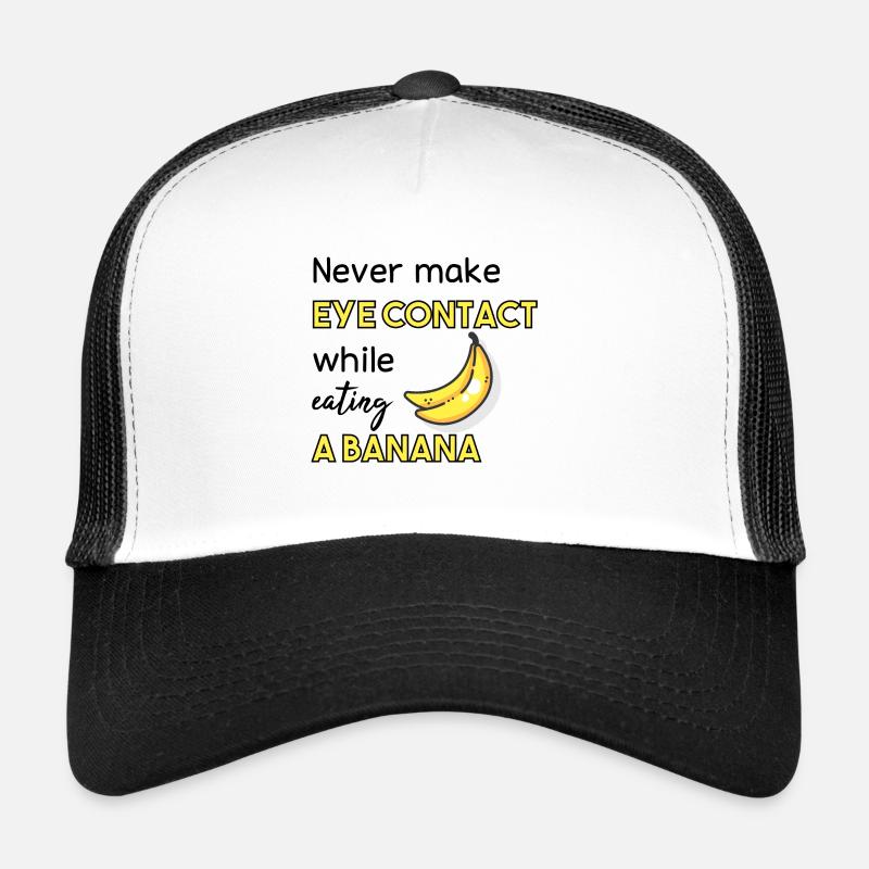 never make eye contact while eating a banana Trucker Cap