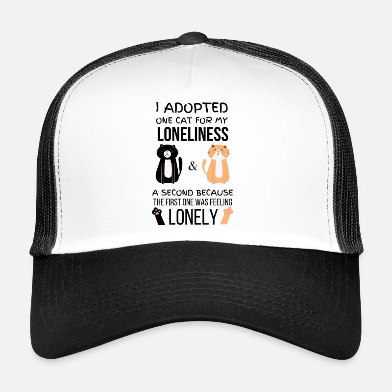 I adopted one cat for loneliness, a second because Trucker Cap