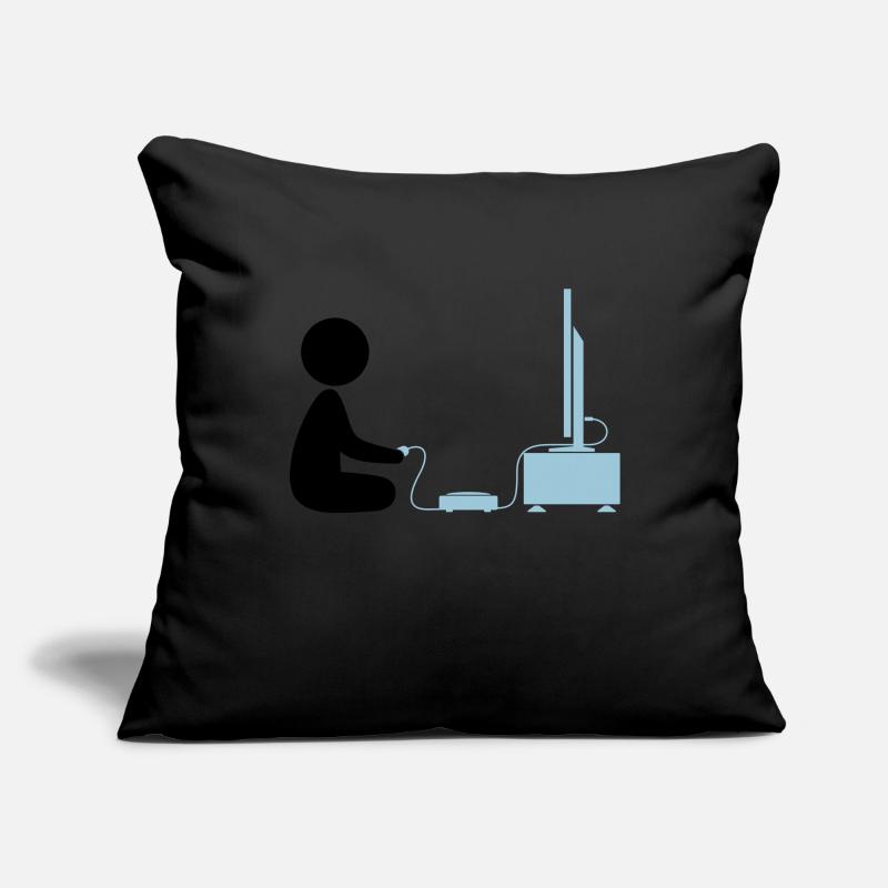 Un garçon joue avec sa console de jeux Housse de coussin décorative 45 x 45 cm