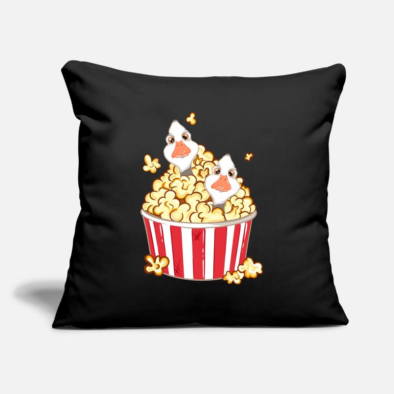 Deux canards jouant dans le pop-corn Housse de coussin décorative 45 x 45 cm