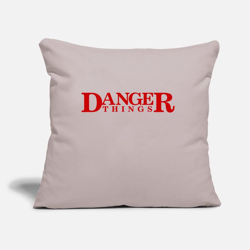 Choses dangereuses Housse de coussin décorative 45 x 45 cm