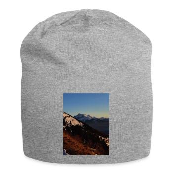 Sonnenuntergang über schneebedeckten Gipfeln - Jersey-Beanie - Grau meliert - Vorne