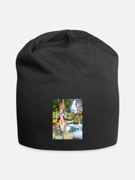 Jeune fille sur balancelle avec cascade d’eau - Bonnet en jersey - noir